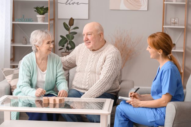 Elderly people suffering from mental disability and caregiver in finding-an-award-winning-memory-care-center-in-mandeville,-la-img