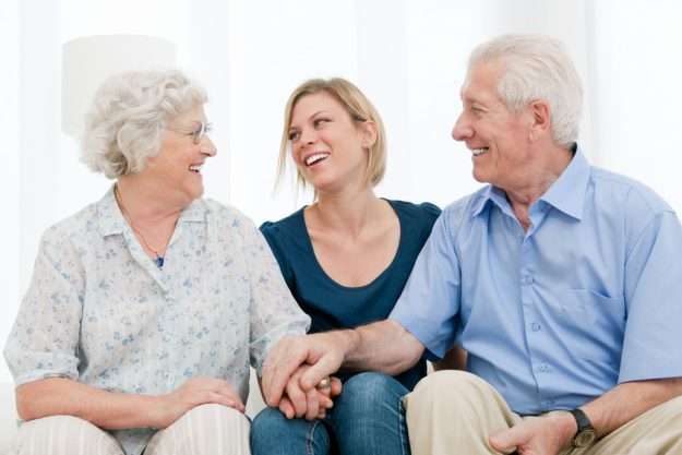 Happy family together what-is-an-assisted-living-community-tips-on-explaining-to-family-members-img