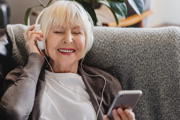 happy-mature-old-woman-wear-headphone Happy mature old woman wear headphone