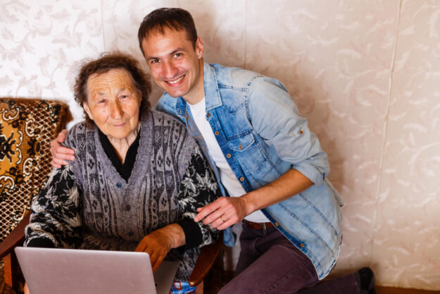 Closeup of elderly woman with young man